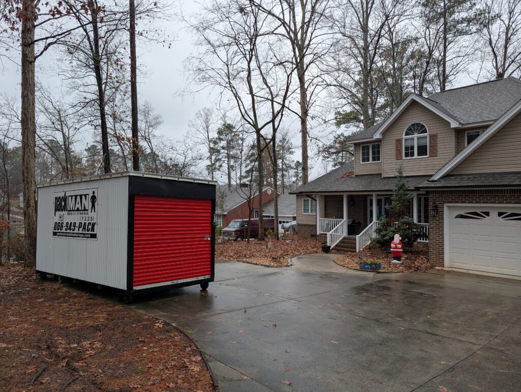 Packman container placed in a Apex driveway